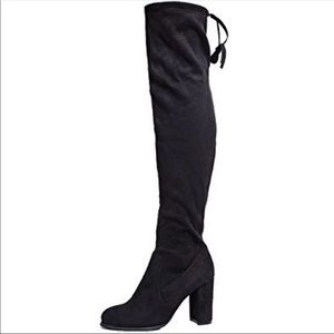 Thigh high black suede boots
